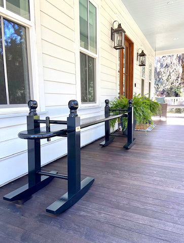 Beautiful front porch with a joggling board as the seating.  