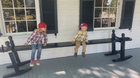 Wiley and Oliver Outland, The Joggle Factory team members, joggling on a porch in Walterboro, SC.  Video showing happy customers and some shop work.